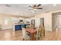 Open-concept kitchen flowing into the dining area, perfect for entertaining at 16966 W Rio Vista Ln, Goodyear, AZ 85338