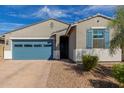 Charming single-story home with a brick driveway and low maintenance desert landscaping at 19924 W Rancho Dr, Litchfield Park, AZ 85340