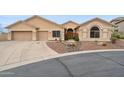 Charming home featuring a well-maintained yard with desert landscaping and a three car garage at 5210 E Calle De Baca --, Cave Creek, AZ 85331