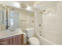 Full bathroom featuring a tub/shower combo, vanity, and ample space at 931 W Hermosa Dr, Tempe, AZ 85282