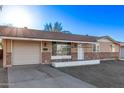 Charming single-story home with a brick accent and a well-lit facade at 12211 N 25Th Ave, Phoenix, AZ 85029