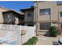 Charming condo with a well-maintained exterior and a glimpse of a private poolside retreat at 16528 E Gunsight Dr # 206, Fountain Hills, AZ 85268