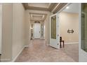 Spacious foyer featuring decorative ceilings and tile flooring, leading to other rooms at 20584 W Hillcrest Blvd, Buckeye, AZ 85396