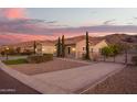 Beautiful desert home with stone accents, mature landscaping and gorgeous mountain views at 3211 E Ian Dr, Phoenix, AZ 85042