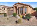 Single story home with desert landscaping, featuring a bay window and an arched entryway at 3517 N Paseo Del Sol --, Mesa, AZ 85207