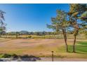 Scenic view of the golf course, mountains and blue sky from the balcony at 4303 E Cactus Rd # 326, Phoenix, AZ 85032
