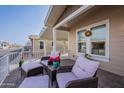 Cozy front porch with comfortable seating, perfect for enjoying the outdoors at 650 N Hawes Rd # 2873, Mesa, AZ 85207
