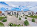 Beautiful single-story home with desert landscaping, providing a serene and welcoming ambiance at 20274 W Highland Ave, Litchfield Park, AZ 85340