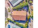 Aerial view of property showing tile roof, landscaping and neighborhood at 654 S 83Rd Way, Mesa, AZ 85208