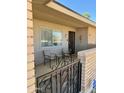 Cozy front porch with seating area, perfect for enjoying quiet moments at 10323 W Deanne Dr, Sun City, AZ 85351