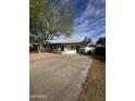 Charming single-story home with a covered porch and low-maintenance landscaping, creating a welcoming curb appeal at 2224 W Fairmount Ave, Phoenix, AZ 85015