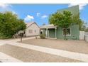Quaint house with desert landscaping, a tiled roof porch, and a welcoming, well-kept exterior at 2715 E Windsor Ave, Phoenix, AZ 85008