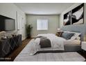 Cozy bedroom with a comfortable bed, contemporary furnishings, and a neutral color scheme at 3825 E Camelback Rd # 292, Phoenix, AZ 85018