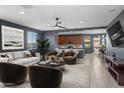 Beautiful living room with plush seating, modern decor, and an open concept design at 16430 W Alameda Rd, Surprise, AZ 85387