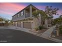 Attractive townhome featuring a private balcony and three garage spaces at 4769 E Thunderheart Trl # 101, Gilbert, AZ 85297