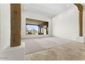 Bright, open living room with large window at 7603 E Soaring Eagle Way, Scottsdale, AZ 85266