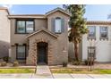 Charming two-story home with a unique brick-lined entryway and neatly kept front yard at 9233 E Neville Ave # 1138, Mesa, AZ 85209