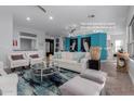 Bright living room with stylish decor and comfortable seating arrangement, perfect for relaxation and entertainment at 14741 E Mountain Majesty --, Fountain Hills, AZ 85268