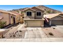 Charming two-story home with a well-maintained front yard and inviting curb appeal, featuring a two-car garage at 16834 S 20Th Pl, Phoenix, AZ 85048