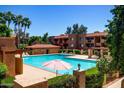 Enjoy the community pool surrounded by lush landscaping and resort-style living at 3031 N Civic Center Plz # 205, Scottsdale, AZ 85251