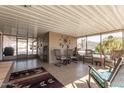 The covered patio provides ample seating, decor, and privacy with views of the community at 3301 S Goldfield Rd # 2034, Apache Junction, AZ 85119