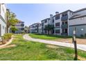 Well-maintained apartment complex featuring landscaped grounds and walkways at 3848 N 3Rd Ave # 1047, Phoenix, AZ 85013
