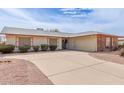 Charming single-story home featuring a two-car garage and well-maintained landscaping at 4701 E Walatowa St, Phoenix, AZ 85044