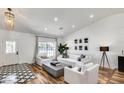 Bright living room featuring modern decor, stylish furnishings, and ample natural light, creating an inviting atmosphere at 6527 W Bloomfield Rd, Glendale, AZ 85304