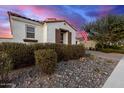 Beautiful single-story home featuring a red tile roof and desert landscaping at 9544 E Theia Dr, Mesa, AZ 85212