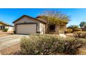 An exterior view of the front of the single Gathering home at 22727 W Papago St, Buckeye, AZ 85326