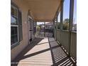 Covered front porch provides ample space for outdoor seating and relaxation at 11411 N 91St Ave # 175, Peoria, AZ 85345