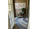 Charming patio features a decorative console table and a modern patterned rug at 14250 W Wigwam Blvd # 812, Litchfield Park, AZ 85340