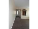 Bright foyer showcasing wood floors and a welcoming entrance with a large window at 29673 N 120Th Ln, Peoria, AZ 85383