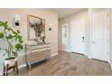 Bright and airy foyer featuring a mirrored console table, stylish decor, and a welcoming entrance at 6130 E Bramble Berry Ln, Cave Creek, AZ 85331
