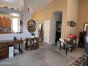 An open living room area features an oval mirror and a desk at 8900 E Rainier Dr, Gold Canyon, AZ 85118