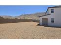 Spacious backyard area with block fence and mountain views at 10031 S 23Rd Dr, Phoenix, AZ 85041
