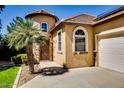 Charming single-Gathering home with a turret and a well-maintained front yard at 16026 N 171St Ln, Surprise, AZ 85388