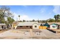 Attractive single-story home featuring desert landscaping, a walkway and mountain views at 1642 E Turney Ave, Phoenix, AZ 85016