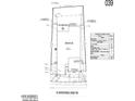Detailed site plan showing property lines, covered patio, and driveway layout at 16721 W Whispering Wind Dr, Surprise, AZ 85387