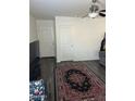 A view of the living room showcasing the front door and tile flooring at 30386 N Juniper Dr, Florence, AZ 85132