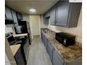 Efficient kitchen featuring stainless steel appliances, ample cabinets, and laminate countertops at 5420 W Lynwood St, Phoenix, AZ 85043