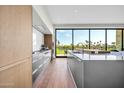 Sleek kitchen with modern cabinets, stainless steel appliances, and a large island perfect for entertaining at 6331 E Phoenician Blvd # 6, Scottsdale, AZ 85251