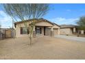 Charming single-story home showcasing desert landscaping and a two-car garage at 2540 E Atlanta Ave, Phoenix, AZ 85040