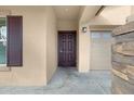 Inviting front entrance with a stylish door and a view of the two-car garage at 2540 E Atlanta Ave, Phoenix, AZ 85040