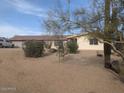 Single story home with desert landscaping, visible truck, and views of the surrounding terrain at 45020 N 18Th St, New River, AZ 85087