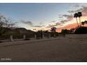 Expansive desert backyard showing a fence and mountain views in the background at 4525 E Onyx Ave, Phoenix, AZ 85028