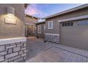 Stunning home featuring brick driveway, stone veneer accents, and three car garage at 6515 W Copper Springs Rd, Phoenix, AZ 85083