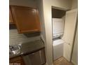 Convenient in-unit laundry closet features stacked washer and dryer at 200 E Southern Ave # 348, Tempe, AZ 85282