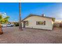 Well-maintained house with desert landscaping and neutral-toned exterior paint at 2301 E Alpine E Ave, Mesa, AZ 85204