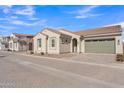 Single-story home featuring neutral colors, tile accents, and an attached two-car garage at 2458 E Lark St, Gilbert, AZ 85297